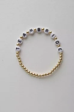 Armband mit goldfarbenen Perlen "Team Bride"<TrendingAbove Best