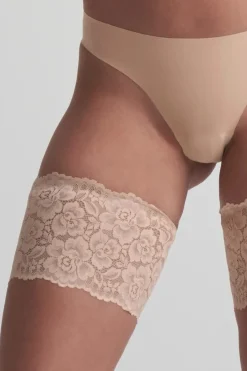 Schenkelbänder aus elastischer Spitze –<Bye Bra