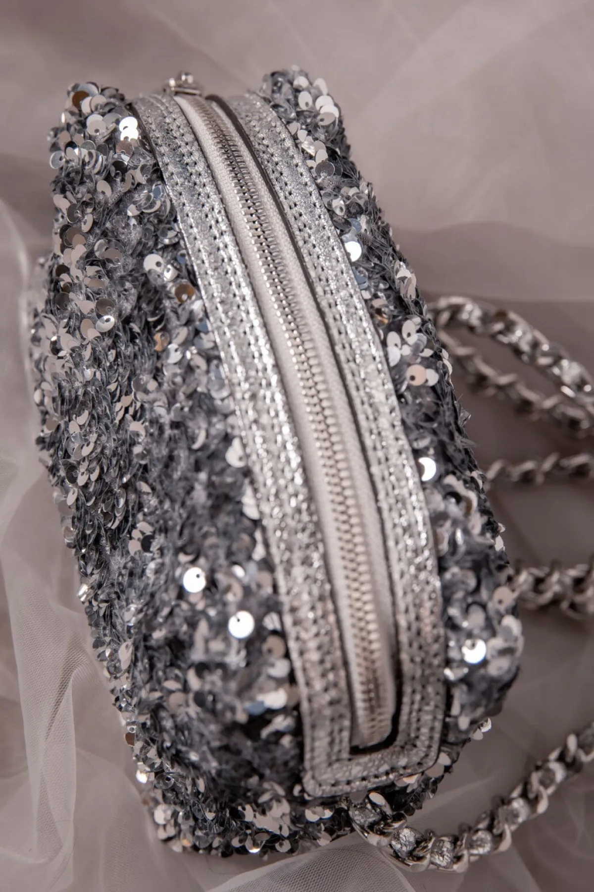 Silberne Handtasche mit Pailletten –<Abro Online