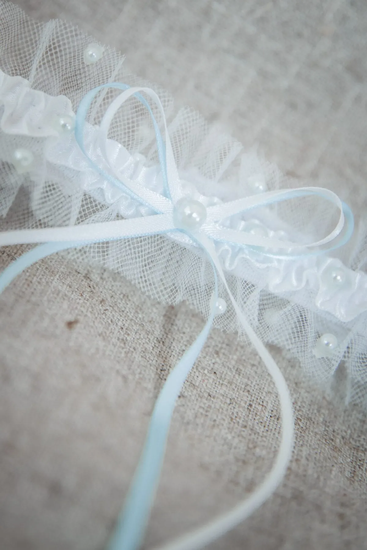 Strumpfband in Ivory mit blauen Kunstperlen<Poirier Hot